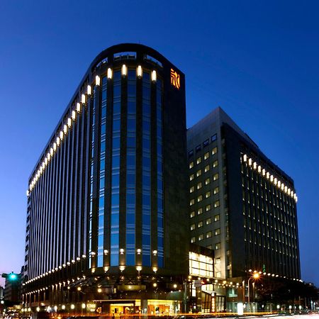 Tempus Hotel Taichung Exterior foto The hotel at night